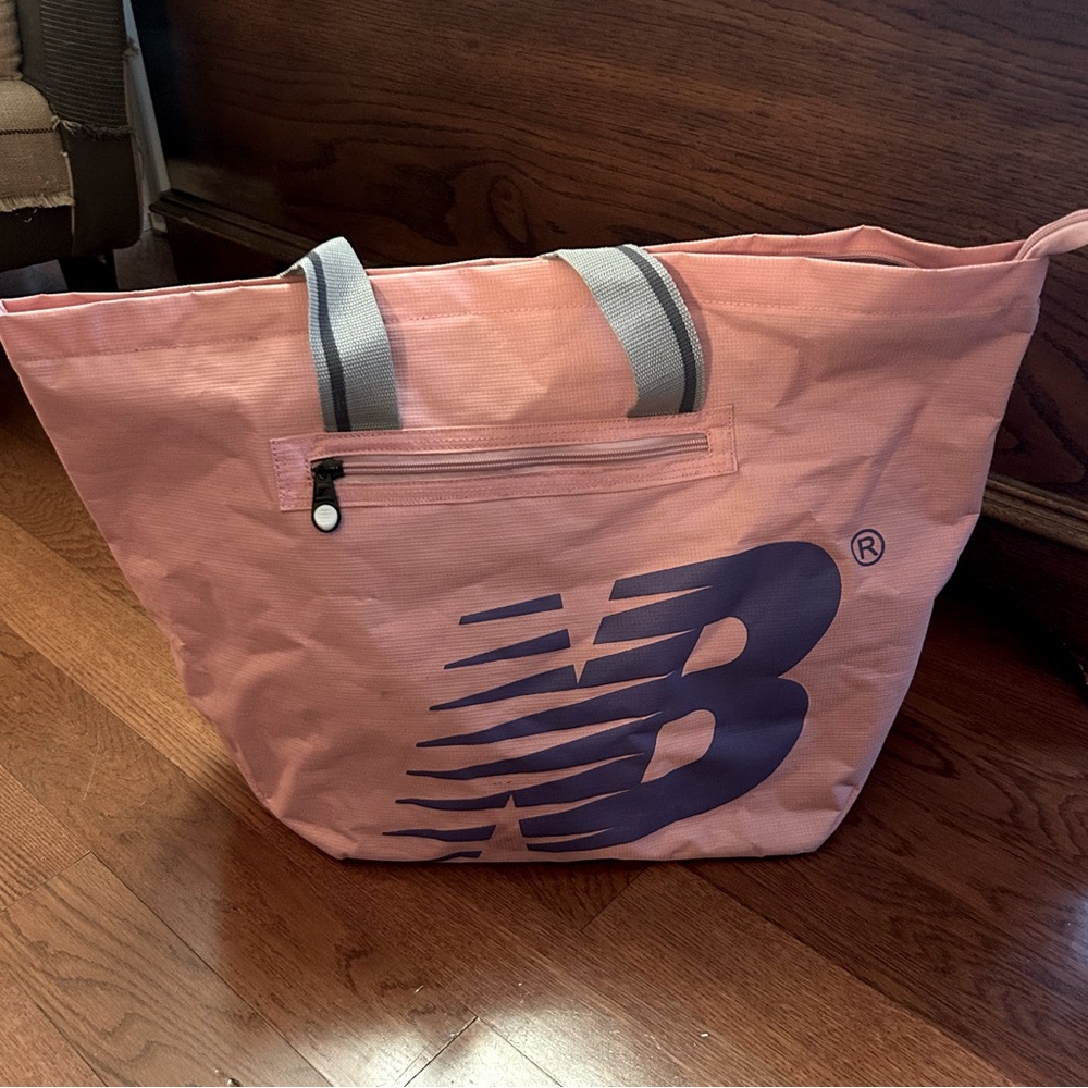 New Balance pink and purple tote bag.
